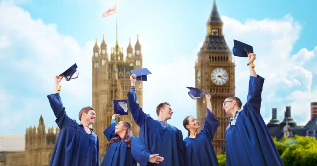 International students celebrating graduation in the UK wearing caps and gowns with Big Ben and the Houses of Parliament in the background